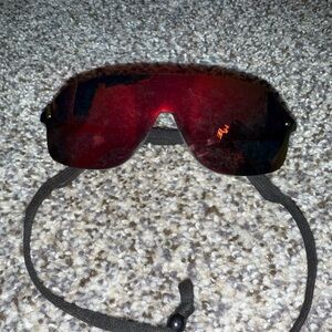 Red sunglasses with neck strap